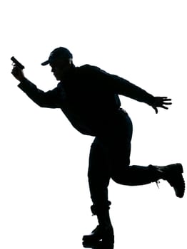An afro American police man running with a handgun on white isolated background