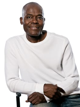 Portrait of an expressive Afro American man smiling with eyes wide open in studio on white isolated background