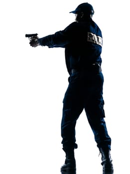 Full length of an Afro American police officer aiming a handgun on white isolated background