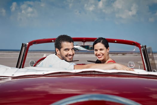 boyfriend and girlfriend sitting in vintage car and hugging in havana, cuba. Horizontal shape, side view, copy space