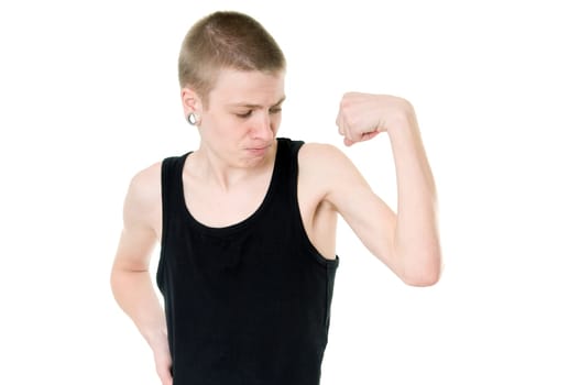 funny skinny teen shows biceps isolated on white background