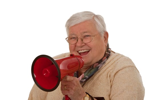 Senior woman with megaphone isolated on white background