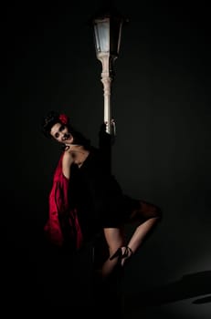 beautiful young glamorous woman  with lightpole