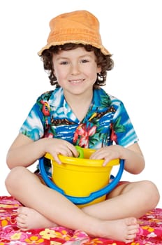 adorable boy playing in the beach over a white back ground