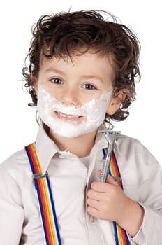 adorable child shaving over a white background
