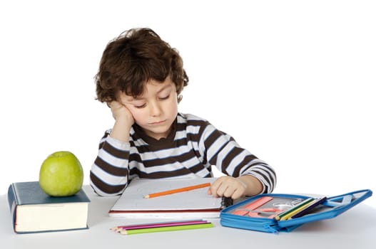 adorable boy studying a over white background
