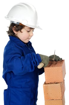 adorable future builder constructing a brick wall a over white background