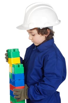 adorable future builder constructing a brick wall with toy pieces a over white background