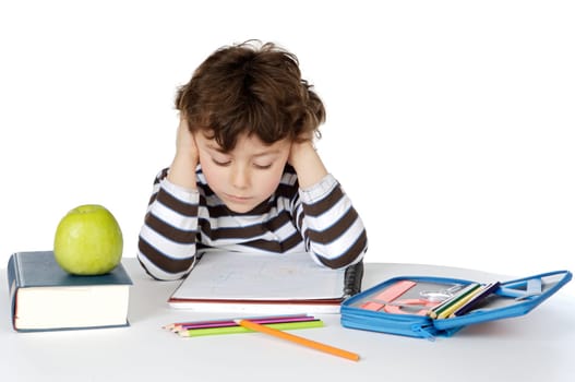 adorable boy studying a over white background