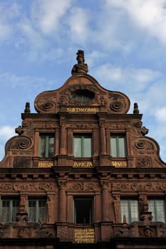 On Heidelberg's main street - exactly opposite the tower of the Church of the Holy Spirit - stands the House of the Knight of St. George