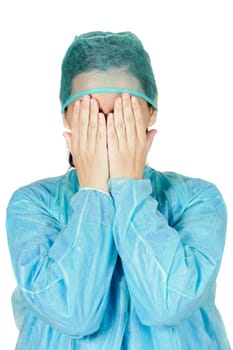 young woman doctor worried with the hands in its face