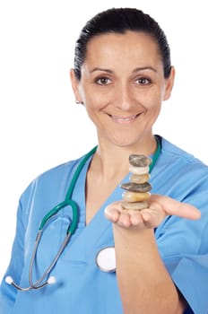 Beautiful medical staff member with balanced stones