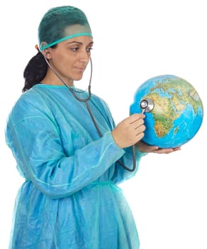 Lady doctor examining the planet earth a over white background