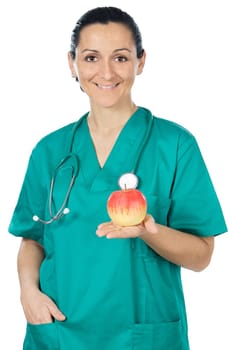 Attractive llady doctor and apple a over white background
