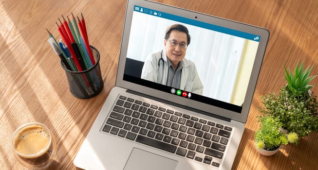 Doctor video call online by modish telemedicine software application for virtual meeting with patient