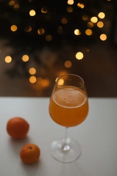 tangerine juice with tangerines on the background of the Christmas. High quality photo