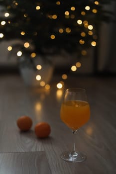 tangerine juice with tangerines on the background of the Christmas. High quality photo