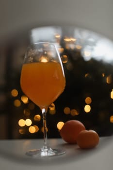 tangerine juice with tangerines on the background of the Christmas. High quality photo