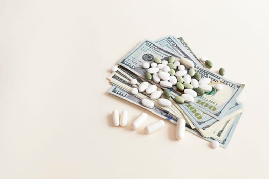 Many Dollar Money Banknotes And Different Pills Or Tablets. Space for Text. Expensive Medication And Healthcare Insurances. Inflation. Pharmaceutical Industry And Big Pharma. Horizontal Plane.