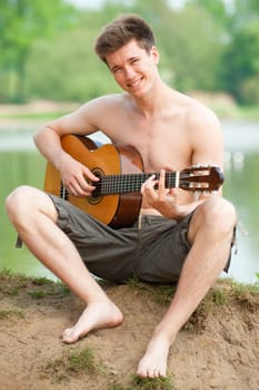 Young man with a guitar