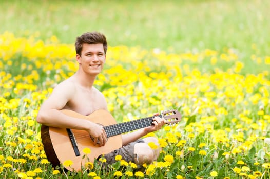 Young man with a guitar