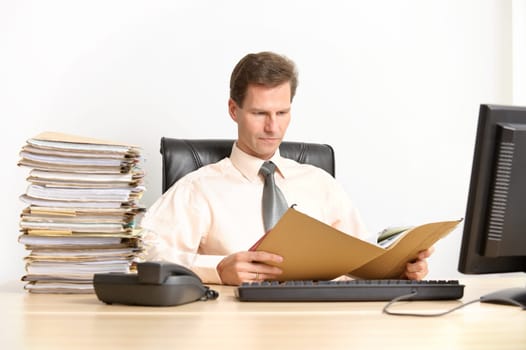 Middle-aged businessman in office
