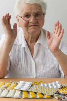 Senior woman with tablets