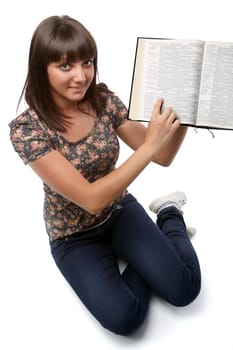 Young woman showing an important verse for her (from the Bible).