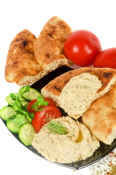 Bread with pate and fresh vegetables of tomatoes and cucumbers