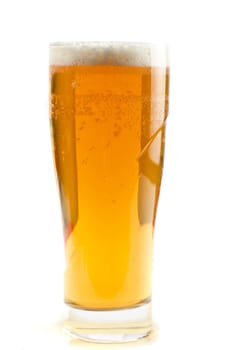 Glass of beer isolated on a white background
