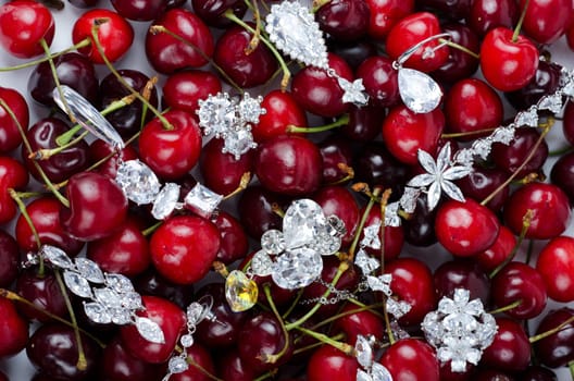 Jewels at fruit red ripe cherries berry background