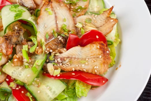 Salad of smoked eel, lettuce,Chinese cabbage and vegetables