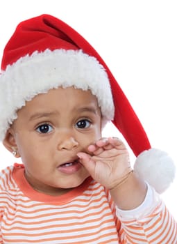 Adorable baby girl with santa hat over white background