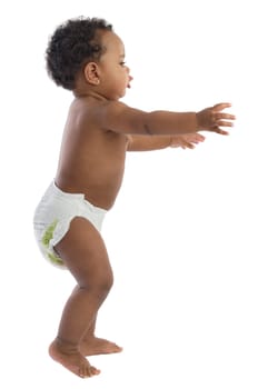 Girl learning to walk a over white background