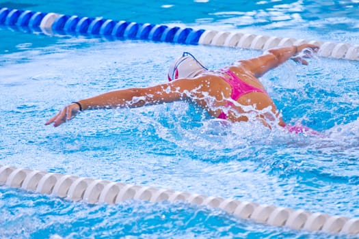 woman swimming during a competition