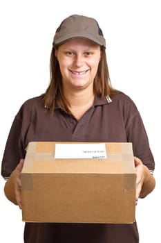 smiling delivery woman holding a big parcel isolated on white