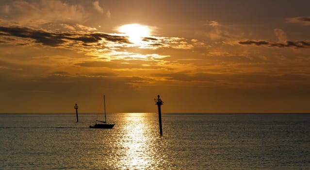 Sailboat at dawn, taken from Barcelona on the Mediterranean sea.