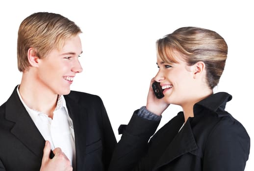 Young smiling woman with cellphone and young smiling man  isolated on white