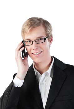 Young handsome smiling man in glasses speaking on cellphone
