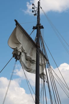 mast and sail of old hanseatic sailing ship