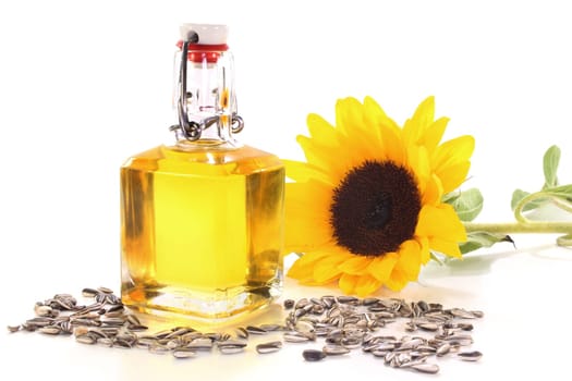 a bottle of sunflower oil with sunflowers