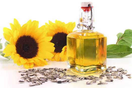 a bottle of sunflower oil with sunflowers