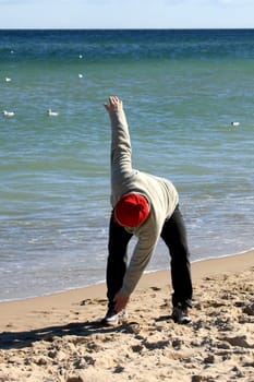 Gymnastics on the beach