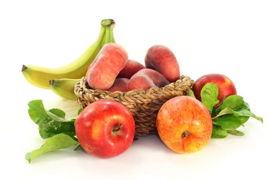 Different types of fruit against white background