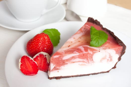 Homemade Strawberry Cheesecake and Coffee on The Table