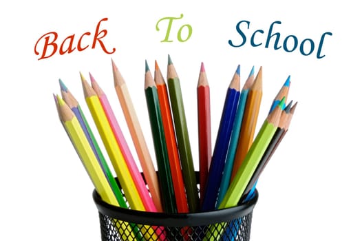 color pencils over a white background (text back to school)