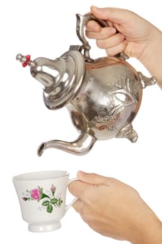 Teapot and cup for the hour of tea
