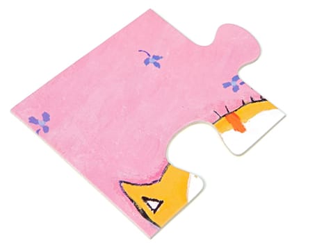 A piece of a puzzle a over white background