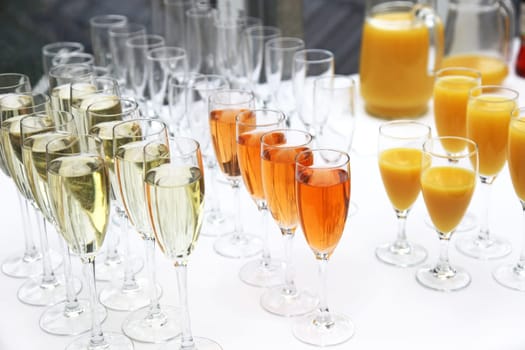Many glasses of sparkling wine,champagne and cocktails in a row at the champagne reception