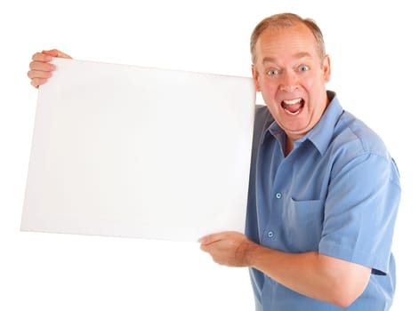 A man is holding and showing a blank white sign.